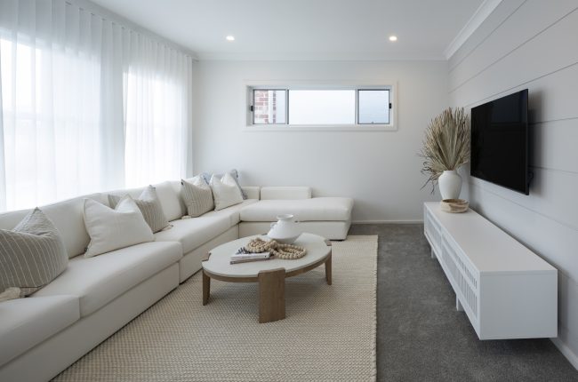 Carolina 1 311 theatre room with white furniture and panelled walls