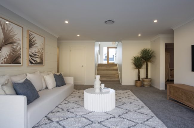 Carolina 1 311 rumpus room with fluffy rug and white furniture