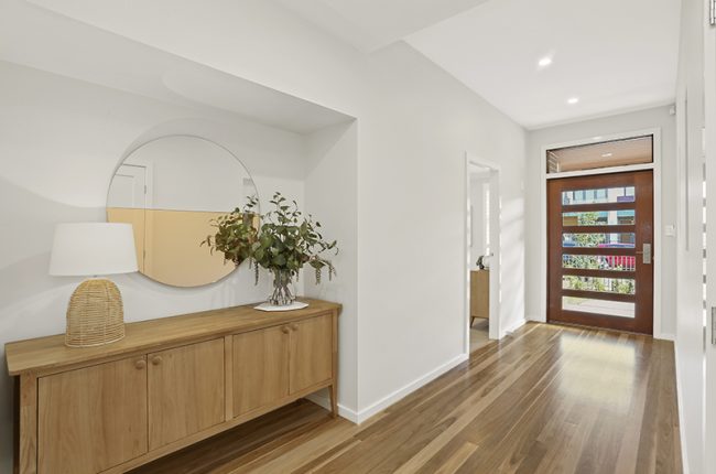 Avalon 1 242 entryway with statement timber door