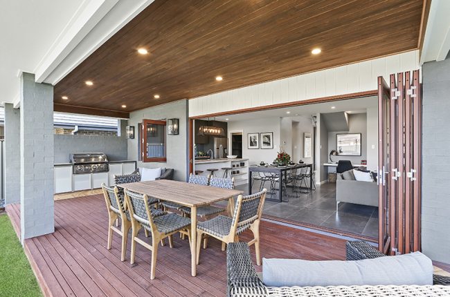 Newport 260 outdoor entertaining area with timber furniture