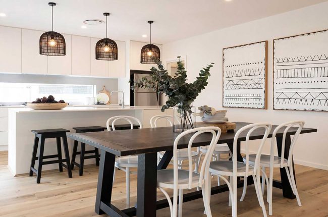 Avalon 1 249 dining room with geometric wall art and plant life