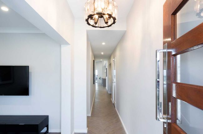Southport 217 entrance hallway with chandelier