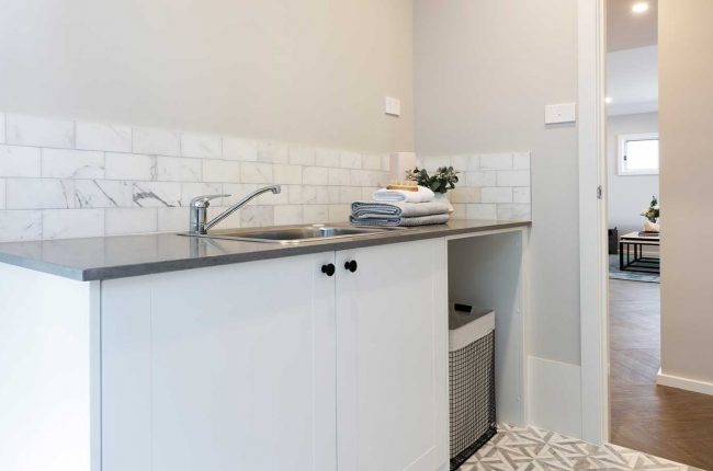 Southport 217 laundry area with marble style brickwork