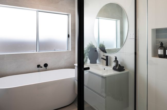 bathroom with freestanding porcelain bath