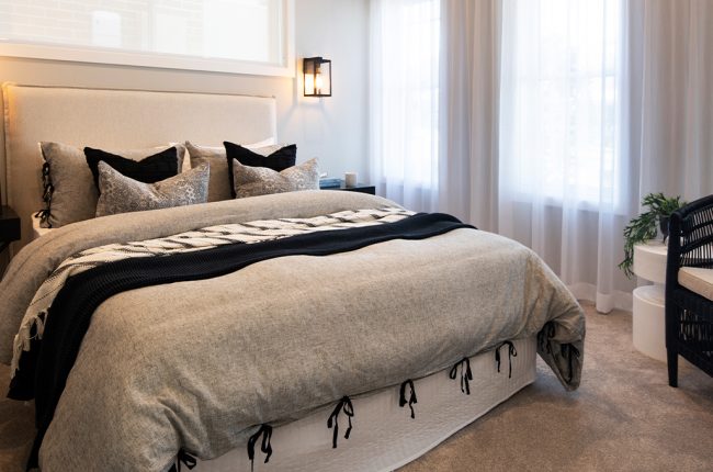 master bedroom with black, grey and white colour scheme