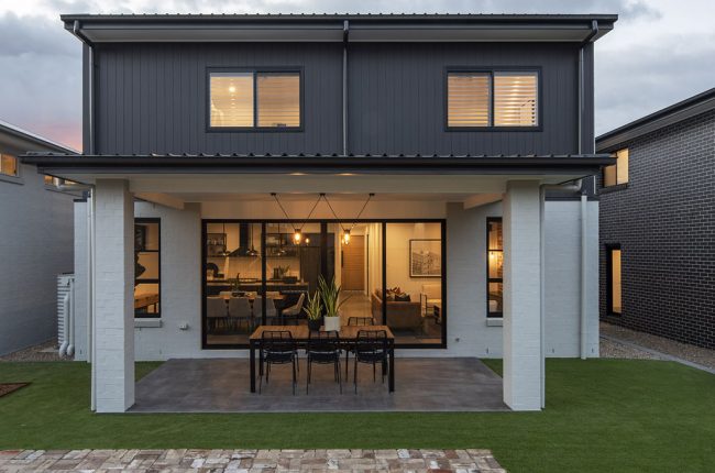 Cayman 349 outdoor entertaining area with fresh cut grass