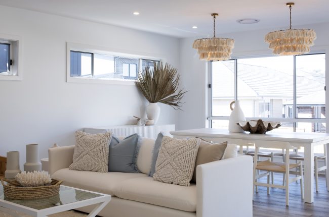 Carolia 1 311 living and dining room with macrame style chandeliers