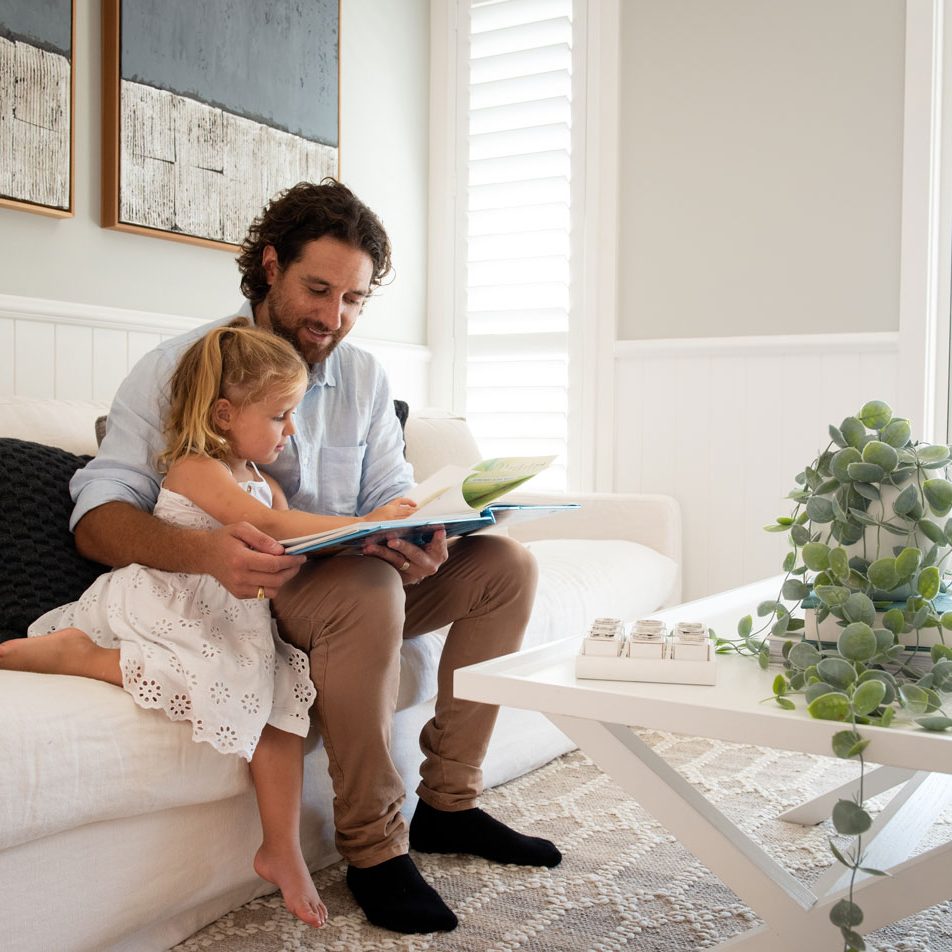 Father and daughter reading